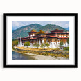 Extra large abstract art print featuring a colorful, textured scenery of Bhutan, in a black frame.