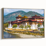 Framed canvas featuring a vintage-style landscape painting of Bhutan, with muted gold and black tones.