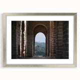 Textured art print of the Great Wall of China in muted earth tones on a framed canvas, suitable for bedroom decor.