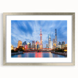 Textured abstract art print of Shanghai skyline in muted grays and blues on a framed silver mat.