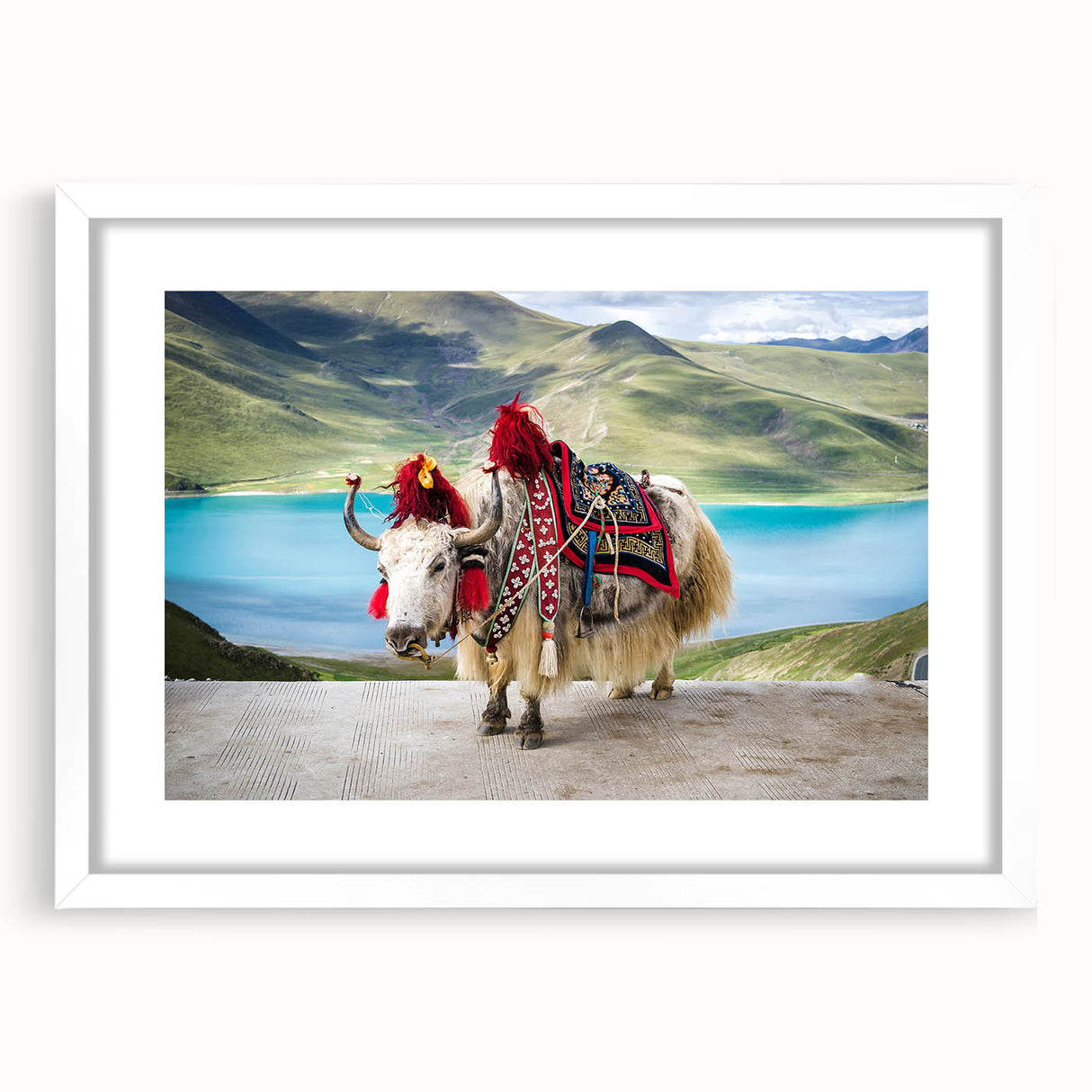 Abstract art print of a Tibetan landscape in muted earth tones on a white-framed canvas.