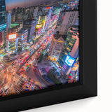Close-up of a textured black wall art depicting Seoul's skyline with vibrant, colorful accents on a large framed canvas.
