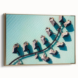 Framed canvas wall art featuring a serene Maldivian landscape in muted blues and greens, ideal for bedroom decor.