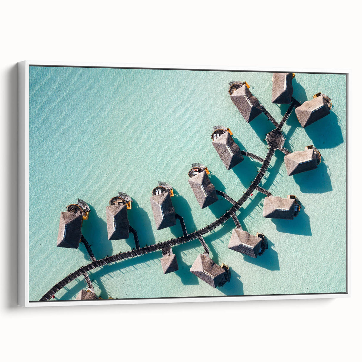 Framed canvas depicting a vintage poster art of the Maldives in vibrant colors, ideal for living room decor.