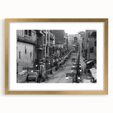 Extra large abstract art print depicting textured scenery of Pakistan in muted earth tones, framed in gold.