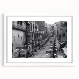 Abstract art print featuring muted earth tones and geometric shapes on a white framed canvas, suitable for dining room decor.