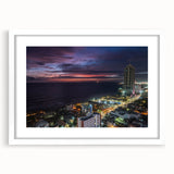 Abstract art print of a Sri Lankan landscape in muted green and blue tones on a framed white canvas.