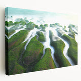 Side view of a large stretched canvas depicting a serene Taiwanese landscape in muted green and blue tones.