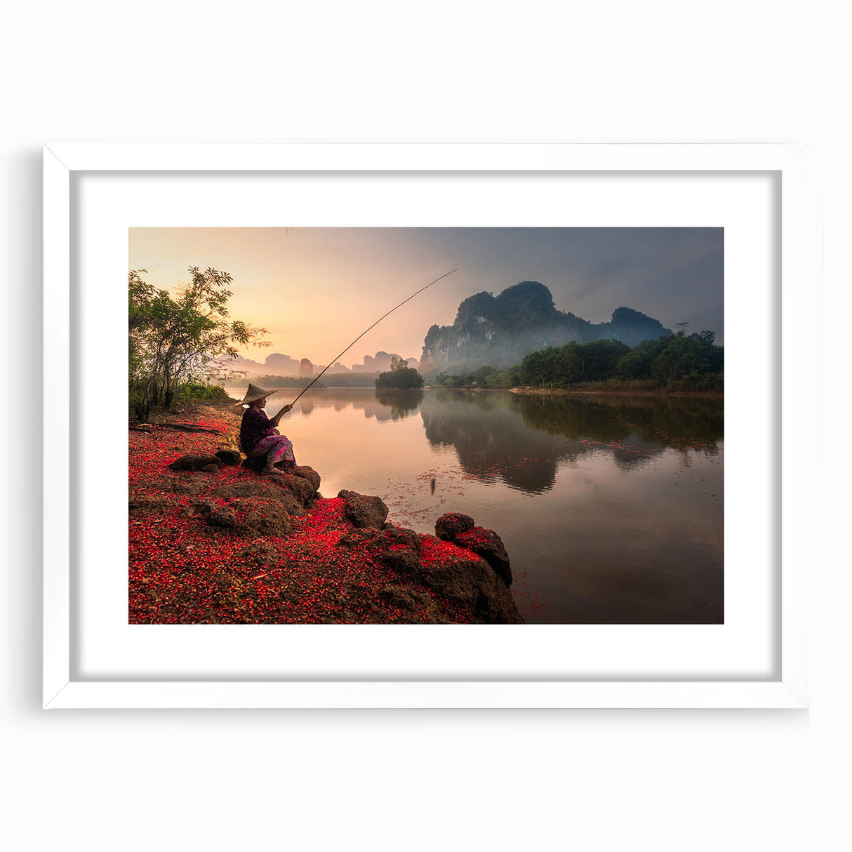 Abstract art print of a serene Thai landscape in soft blue and green hues, framed in white.