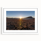 Textured abstract art print depicting Queensland scenery in muted earth tones on a framed white canvas.
