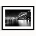 Extra large abstract art print of Sydney scenery in vibrant colors on a textured canvas, framed in black.