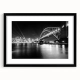 Extra large abstract art print of Sydney scenery in vibrant colors on a textured canvas, framed in black.