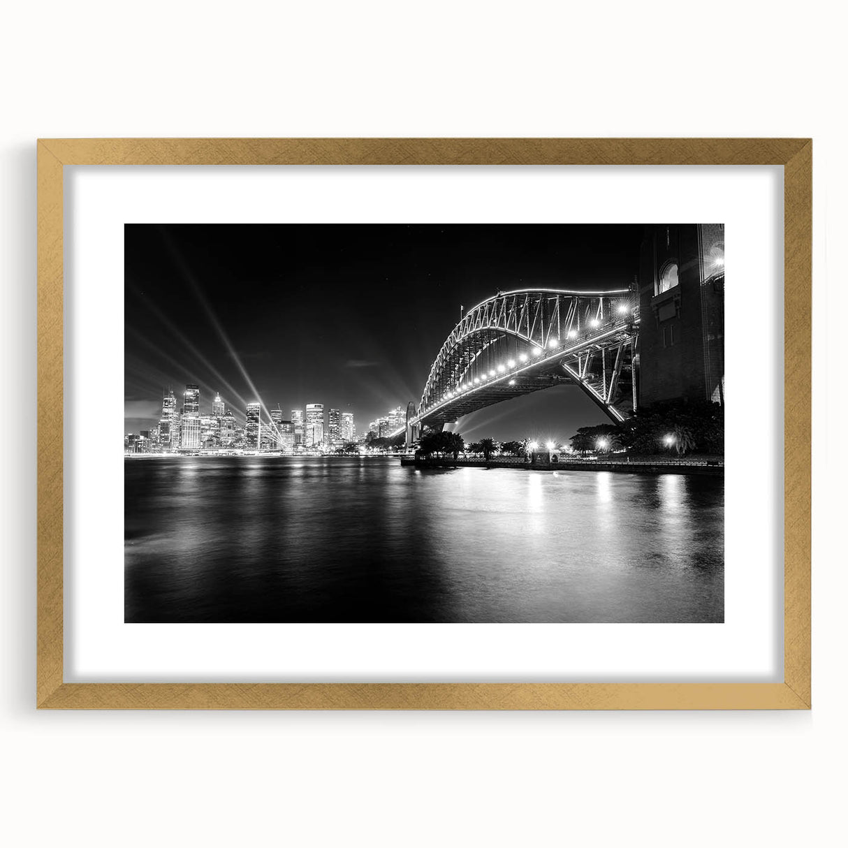 Abstract art print of Sydney skyline in muted gold and blue tones, framed with a gold mat, suitable for dining room decor.