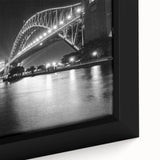 Close-up of textured black wall art featuring colorful Sydney skyline on framed canvas, ideal for living room decor.
