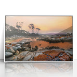 Large art print of a Tasmanian landscape in muted greens and blues on a white framed acrylic.