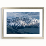 Textured art print depicting an abstract British Columbia landscape in muted earth tones, framed in silver.