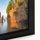 Black wall art depicting a textured New Brunswick scenery in vibrant colors on a framed canvas, ideal for living room decor.