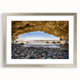 Textured abstract art print of Newfoundland scenery in muted earth tones, framed in silver, ideal for bedroom wall decor.