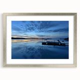 Textured art depicting an abstract scenery of the Northwest Territories in muted earth tones on a framed silver mat.