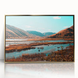 Acrylic print of a serene Nova Scotia landscape in soft blues and greens, framed in gold.