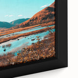 Framed canvas of a textured black wall art depicting colorful Nova Scotia scenery, ideal for living room decor.