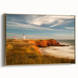 Framed canvas featuring a vintage-style landscape painting of Quebec, with lush greens and muted gold.