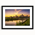 Abstract art print of colorful, textured scenery in Saskatchewan on a black-framed, matted canvas.