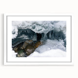 Abstract art print of Yukon scenery in muted blue and green tones on a framed white mat, ideal for dining room decor.