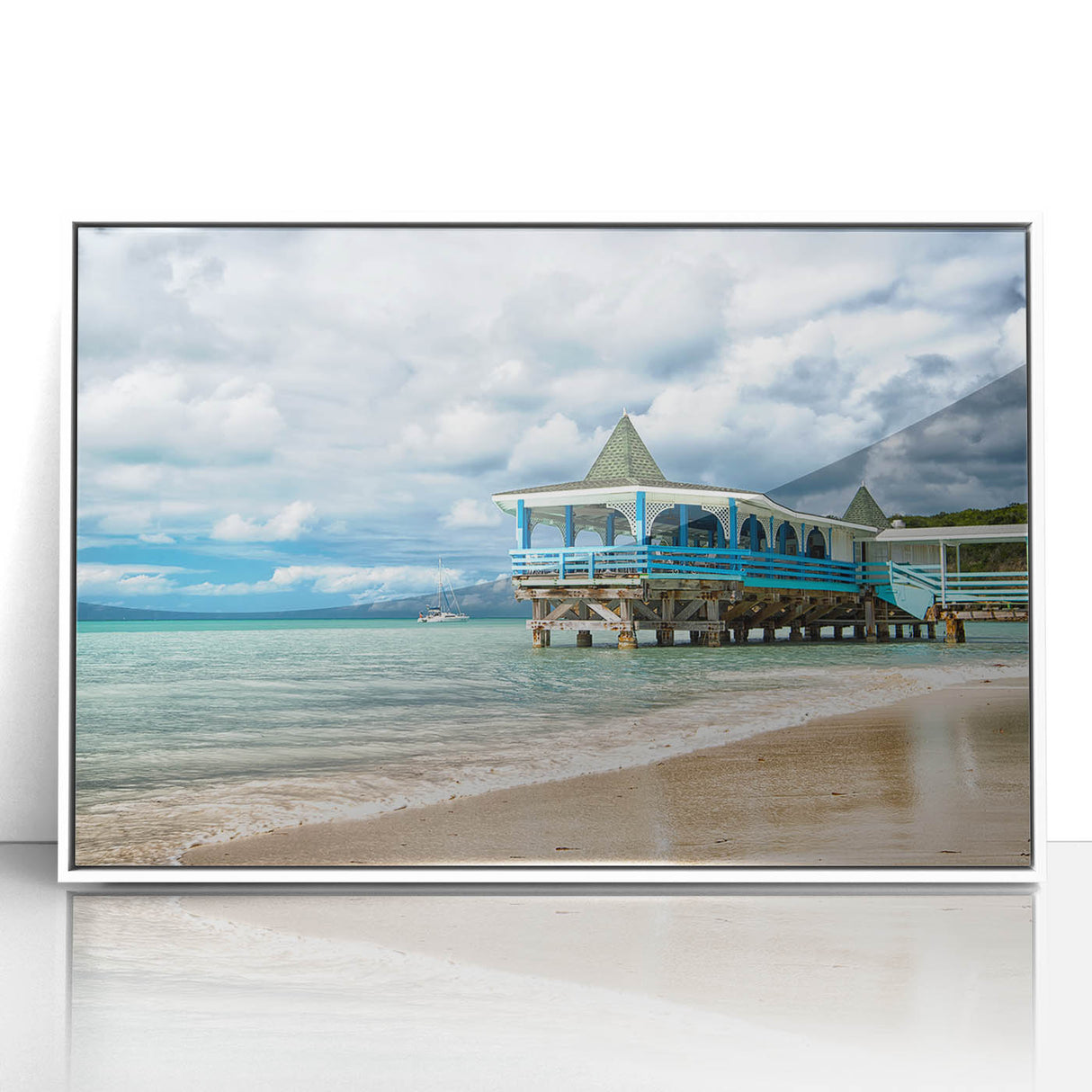 Mid-century modernist art depicting Antigua scenery on white-framed acrylic, with muted blue and green tones.