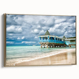 Framed canvas depicting a vintage-style Caribbean landscape, featuring muted gold and black tones.