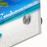 Large abstract wall art depicting Caribbean scenery in vibrant blue tones on acrylic glass.