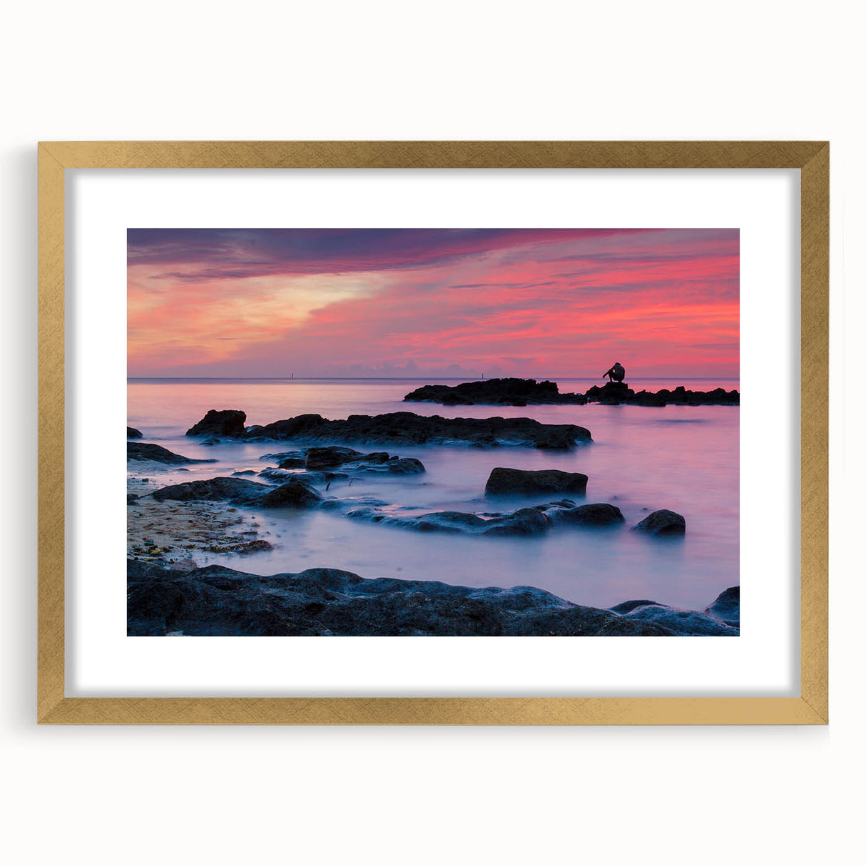 Abstract art print of Caribbean scenery in gold frame, featuring soft blue and green tones, ideal for dining room decor.