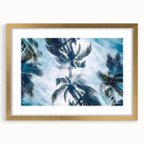Textured abstract art print of Caribbean scenery in muted blue and green tones, framed in gold, ideal for bedroom wall decor.