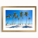 Abstract art print featuring Caribbean scenery in muted blue and green tones, framed in gold, suitable for dining room decor.