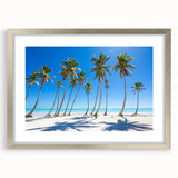 Extra large abstract art print depicting a Caribbean landscape in muted blue and green tones on a framed canvas.