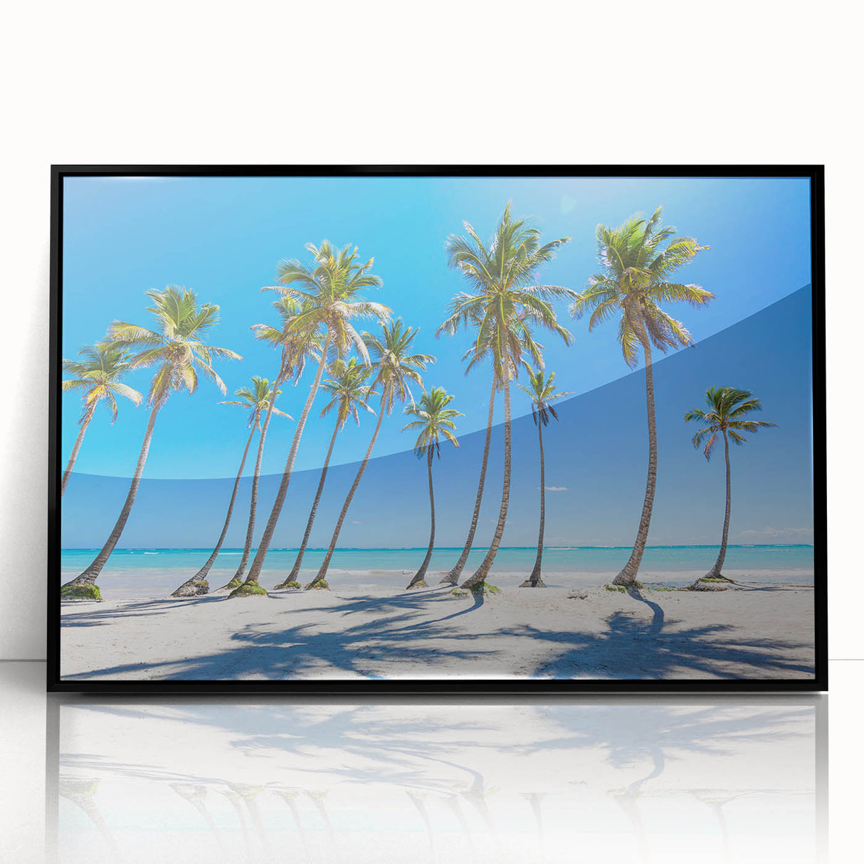 Large abstract wall art of a Caribbean scene in vibrant blues and greens on a framed acrylic.