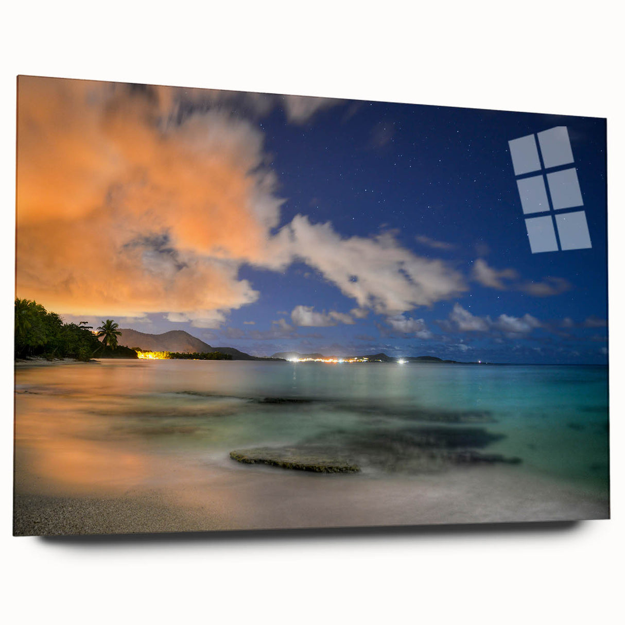 Large abstract wall art of a Caribbean scenery in vibrant blue and green hues on acrylic glass.