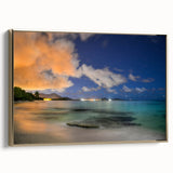 Framed canvas landscape art depicting a serene Caribbean scene in muted blues and greens, ideal for bedroom decor.