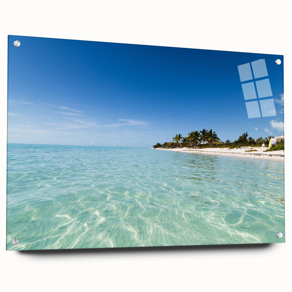 Large abstract wall art of Caribbean scenery on acrylic glass, featuring vibrant blue and green tones.