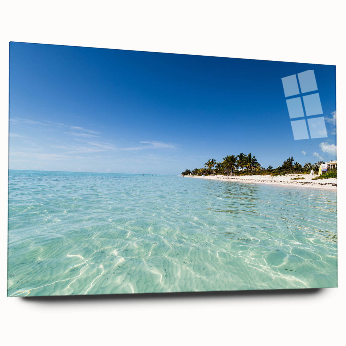 Large abstract wall art of a Caribbean scene in vibrant blue and green tones on acrylic glass.