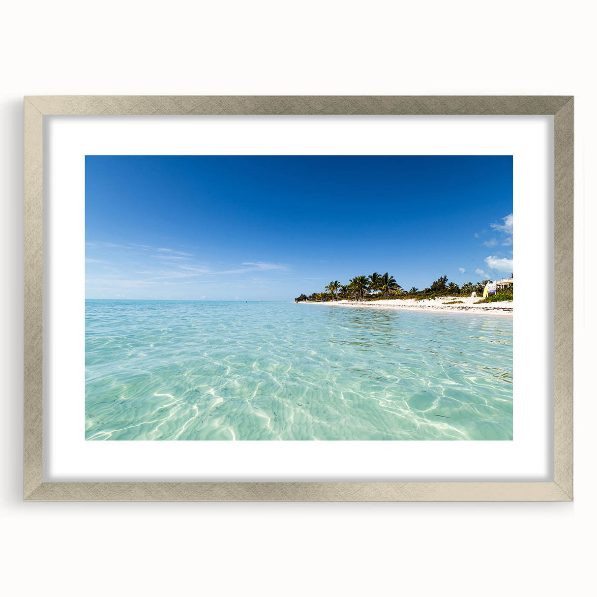 Extra large abstract art print of Caribbean scenery in textured style, framed in silver, ideal for living room decor.