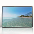 Large abstract wall art featuring a Caribbean scene in muted blue and green tones on a framed acrylic.