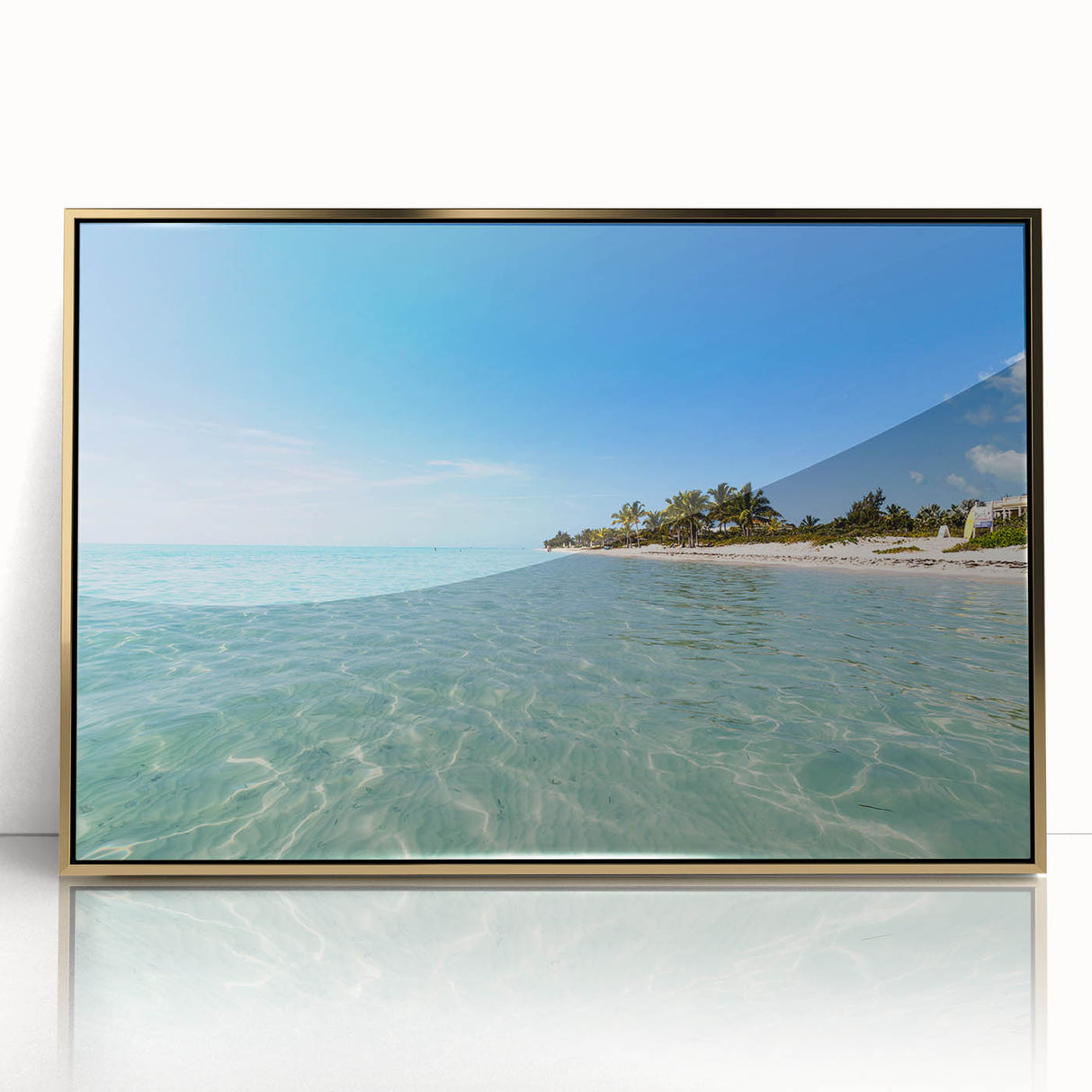 Art deco style poster of a Caribbean scenery, framed in gold acrylic, with vibrant blue and green tones.