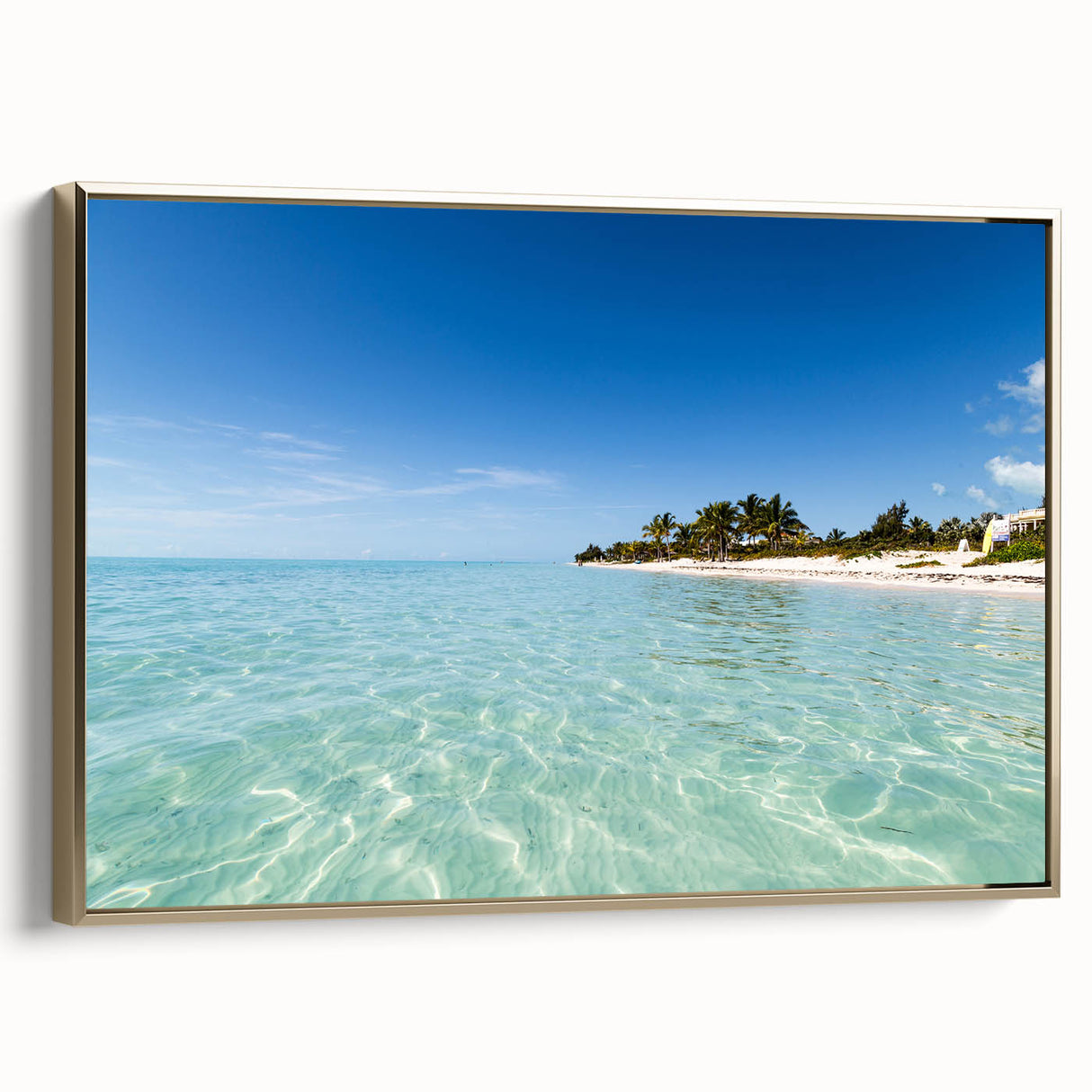 Framed canvas wall art depicting a Caribbean landscape in muted green and blue tones, ideal for bedroom decor.