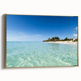 Framed canvas wall art depicting a Caribbean landscape in muted green and blue tones, ideal for bedroom decor.