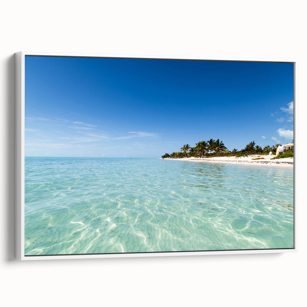 Vintage poster art of Caribbean scenery on a large framed canvas with vibrant colors, ideal for living room decor.