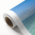 Art deco poster of Caribbean scenery on rolled canvas, featuring pastel ocean colors, ideal for nursery wall art.
