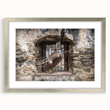 Textured abstract art print depicting a Central American landscape in earthy tones on a framed silver mat.