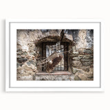 Abstract art print of a Central American landscape in vibrant earth tones on a white framed canvas.