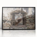 Large abstract wall art depicting a Central American scenery in muted earth tones, framed in black acrylic.